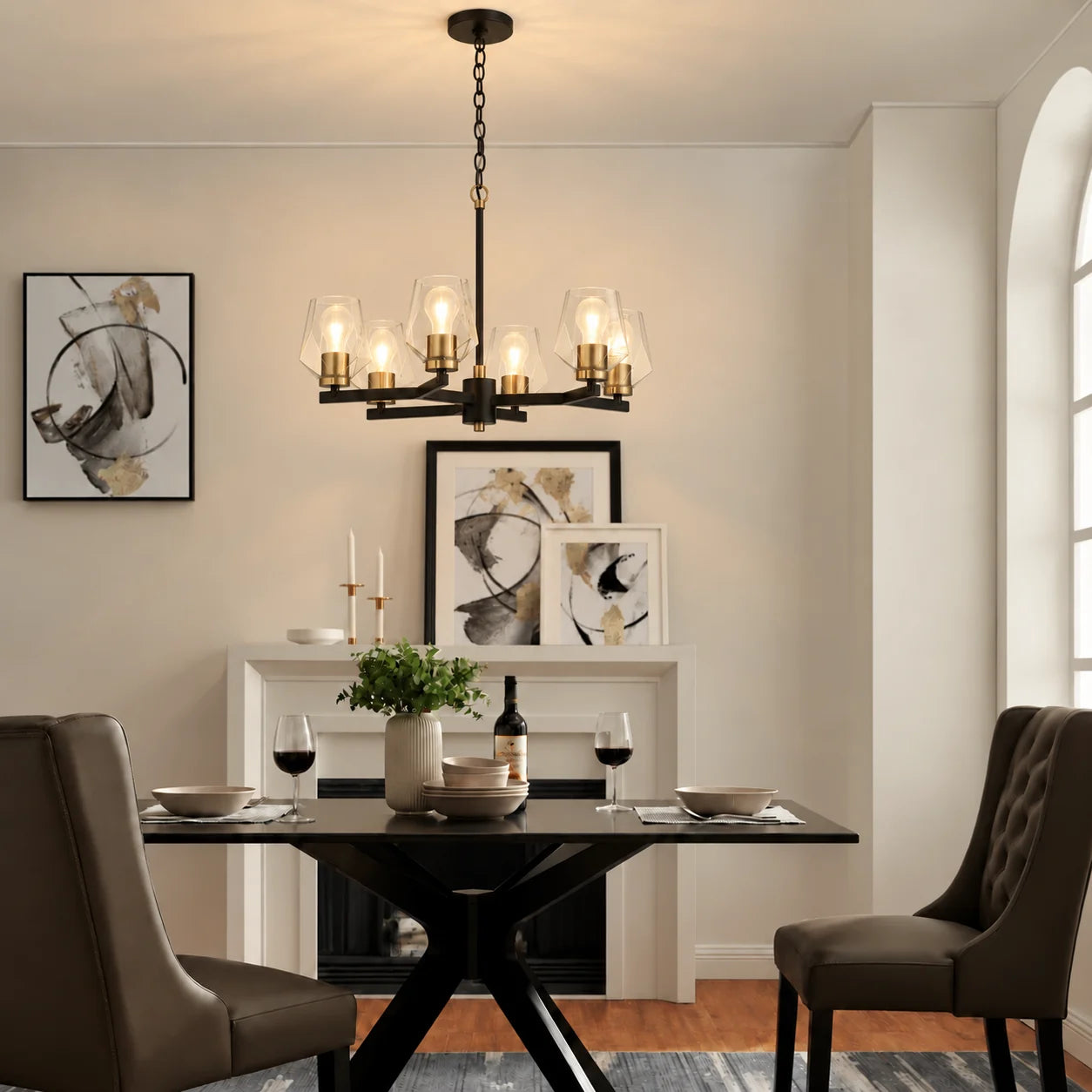 Dining room transformed by the Avante Grand chandelier in flat black and satin brass